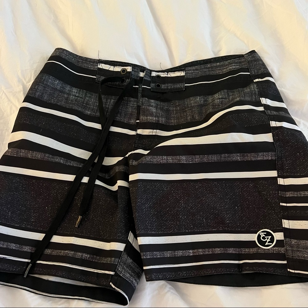 Black stripe swim trunks